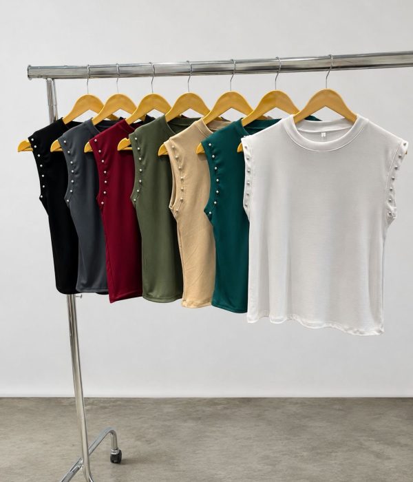 COD 194 MUSCULOSA AMPLIO TACHAS